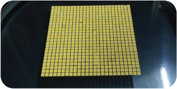 Wafer placed on XY table for initial positioning in wafer inspection machine