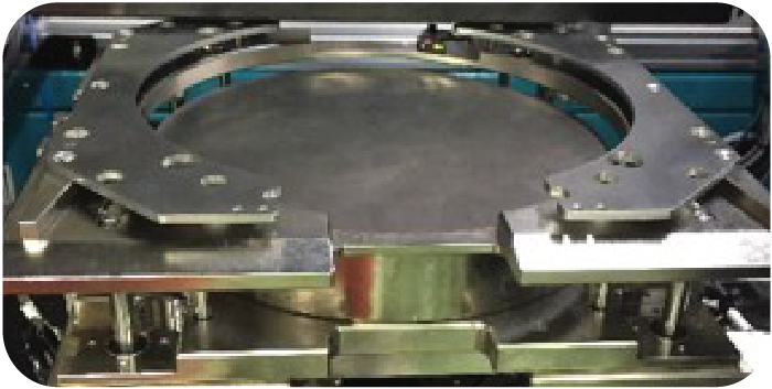 Wafer inspection machine XY table returning to unload position after inspection