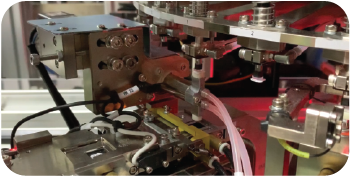 Flipper unit reorients components into pocket tape for automated optical inspection system output