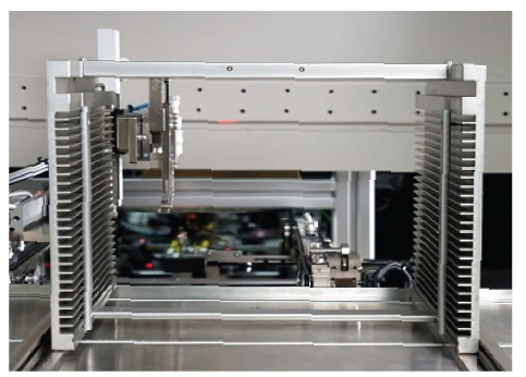 Close-up view of wire bond machine components showing precision bonding head and assembly mechanisms | WI300