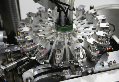 High-speed component feeding system inside a tape and reel machine for automated packaging | MV160