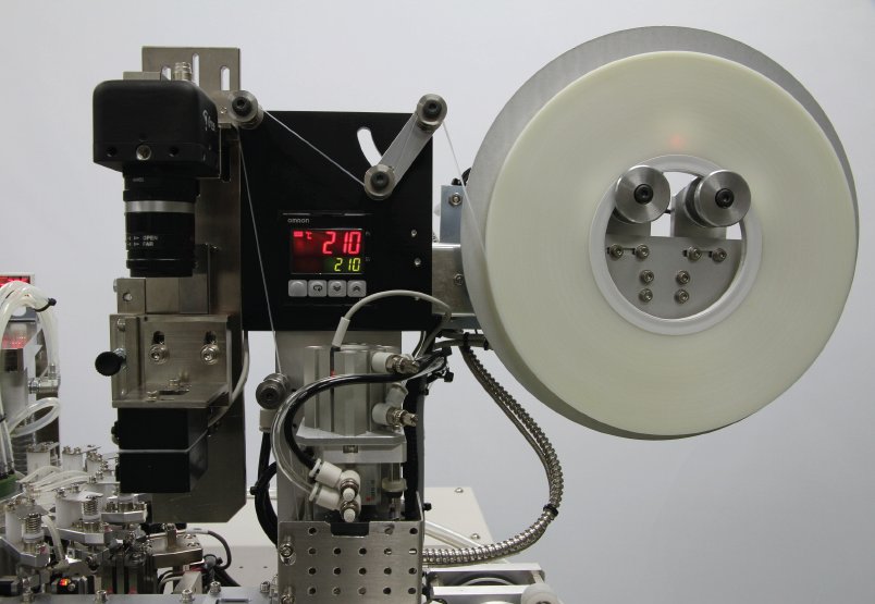 Labeling and reel mechanism of advanced tape and reel machine for accurate component tracking | MV160