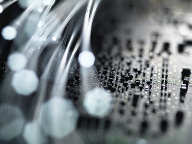 Close-up view of a wire bond inspection from the electronic circuit